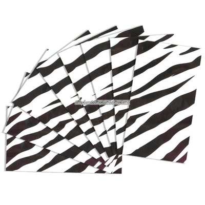 Presentpapper med svart zebramnster - 8 ark